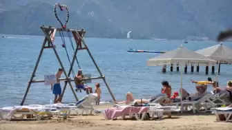 Marmaris’te Yaz Erken Geldi: Sıcaklık 26 Dereceyi Gördü, Plajlar Canlandı